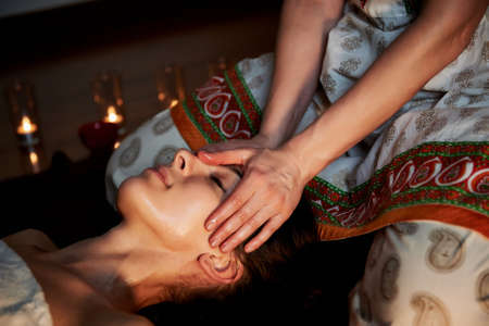 Oil relaxing head massage. Relaxation and therapyの写真素材
