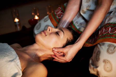 Oil relaxing head massage. Relaxation and therapyの写真素材
