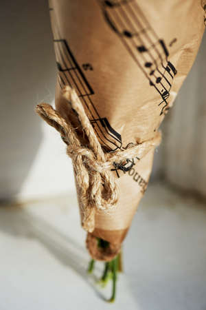 The base of the bouquet , Packed in Kraft paper with a ribbon.の写真素材