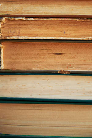 the texture is a stack of old books. Texture or background. Close upの写真素材
