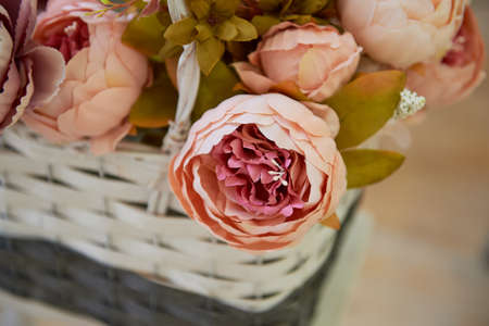 peony artificial rose in a box, standing on the windowsill .Pinkの写真素材