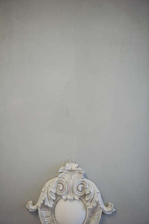 Decorative molding ornaments on the gray wall.Classic decor. Retroの写真素材
