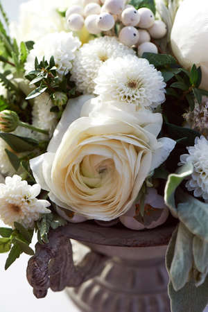 Wedding decor. Floral arrangement with berries white .Floral