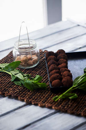 A lot of delicious round chocolate truffles. A work of culinary artの写真素材