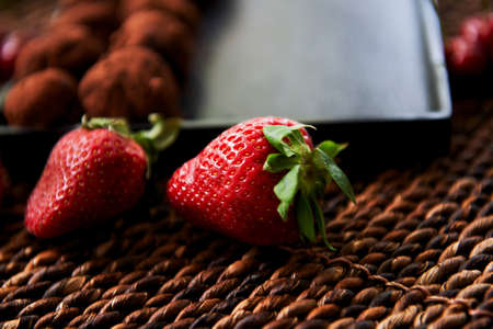 A lot of delicious round chocolate truffles. A work of culinary artの写真素材