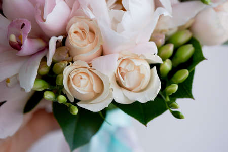 The brides bouquet of soft pink peonies and white roses . Wedding floristry. Classic formの写真素材