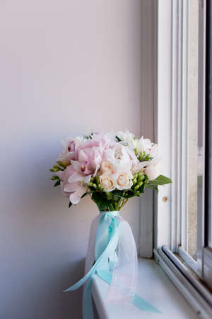 The brides bouquet of soft pink peonies and white roses . Wedding floristry. Classic formの写真素材