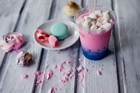bubble tea in pink and blue color in a plastic Cup with a straw. Soft,beautiful colorsの写真素材