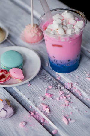 bubble tea in pink and blue color in a plastic Cup with a straw. Soft,beautiful colorsの写真素材