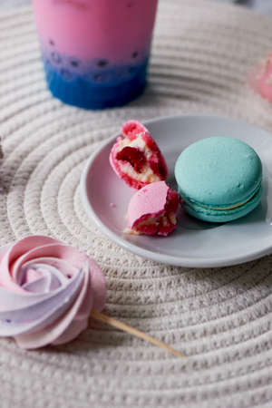 Beautiful sweets pastel shades on a beautiful wooden background. Aesthetic picture. dining, cooking, for children's partiesの写真素材