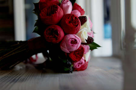 Wedding Bridal bouquet in red, pink, white. Wedding flowers, wedding items and accessoriesの写真素材