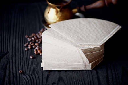 A stack of coffee filters made from Kraft paper. Macroの写真素材
