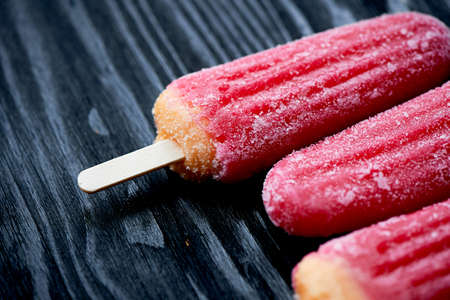 Youth ice pop from the freezer. with a touch of frost and ice. Refreshing in the heat .