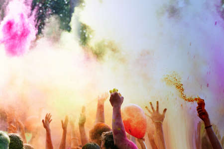 The festival of Indian colors Holi.The time of the throw.Handsの写真素材
