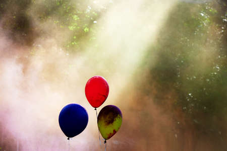 The festival of Indian colors Holi. The time of the throw. In the air hanging balls with paint...