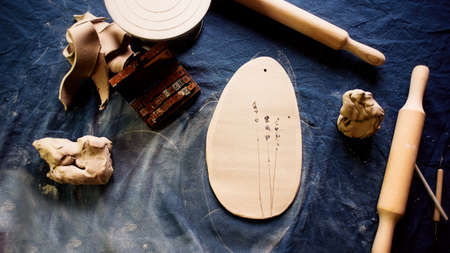 Creative workshop in clay. The tool of the ceramist. Stacks, rolling pin, knife. The view from the...