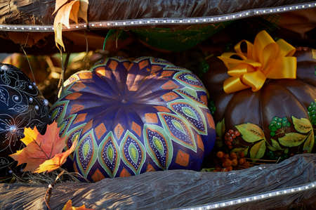 Painted pumpkin. The contest for the harvest festival.の写真素材