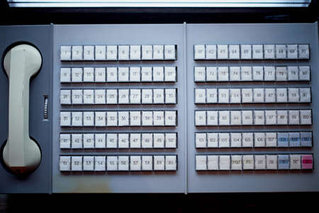 Old telephone switchboard with plastic buttons. Retro, dirty keysの写真素材