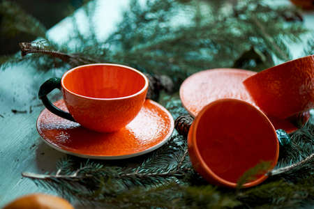 Juicy orange tea pair on the background of fir branches. A feeling of freshness and anticipation of the New yearの写真素材
