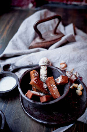 Garlic croutons on a gray linen cloth. Photos atmospheric, rough, rustic style.の写真素材