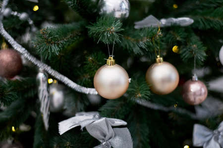 Christmas tree, decorated in silver tones. A sense of celebration.の写真素材