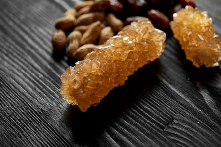 Brown grape sugar in transparent crystals. Eastern sweetness to the tea.の写真素材