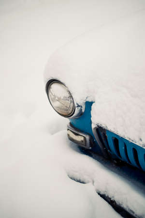 The car, covered with snow. Heavy snowfall, precipitation. The problem of motoristsの写真素材