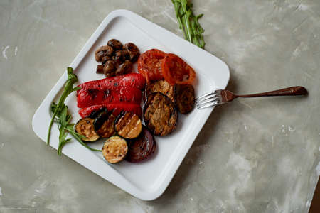 Delicious shiny vegetables, toasted on the grill. Eggplant, pepper zucchiniの写真素材