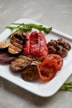 Delicious shiny vegetables, toasted on the grill. Eggplant, pepper zucchiniの写真素材