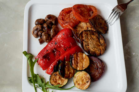 Delicious shiny vegetables, toasted on the grill. Eggplant, pepper zucchiniの写真素材