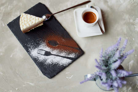 The outline of the fork and spoon , sprinkled with cocoa powderの写真素材