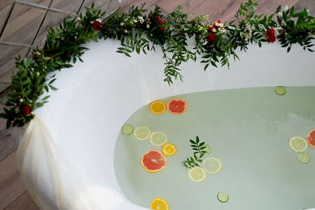 Milk water in the bath, which swim citrus: lime, lemon and grapefruit. Skin care and relaxation,...