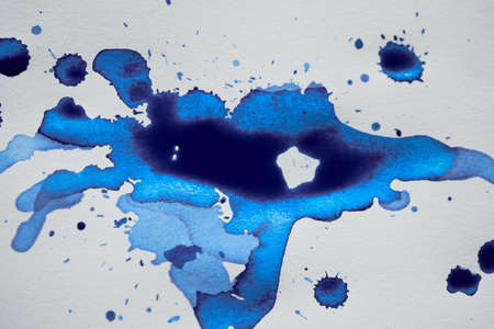 Blue ink blot art, the attributes for the artist.の写真素材