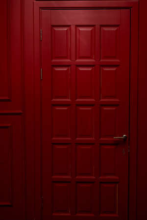 red wooden door in English style. Noble color. Interiorの写真素材