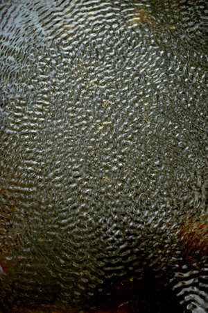 The texture of the ripples on the water. From of vibration, pulsationの写真素材