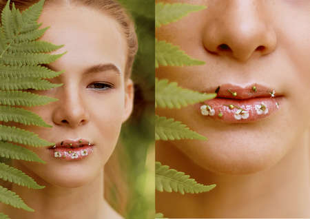 Portrait of a red-haired girl with long hair. The hair gathered in a ponytail. Near the face fern. Artistic portrait. Child of nature. The proximity to the naturalness and naturalnessの写真素材