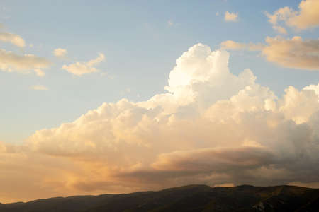 Sky with clouds and see the tops of the mountains. Natureの写真素材