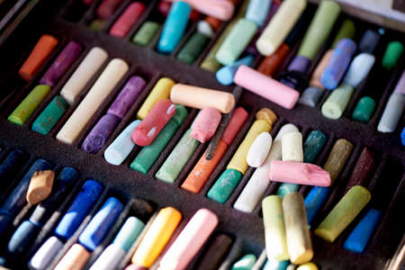 Many different crayons, broken in the work.の写真素材