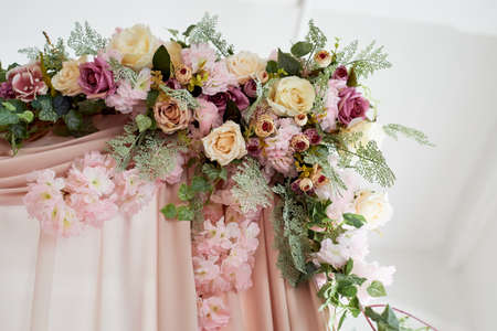 Canopy decorated with flowers . Closely. Pink chiffonの写真素材