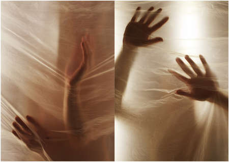Hands through the clear film.Beautiful delicate feminine hands. A symbol of illusiveness and...