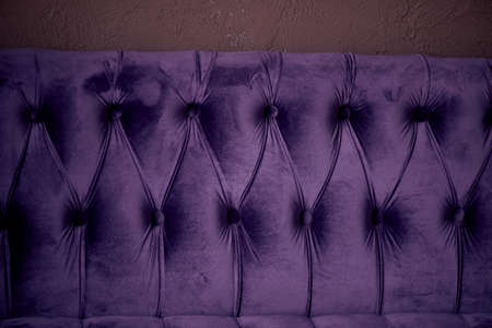Texture, classic sofa upholstery with light fabric buttons.の写真素材