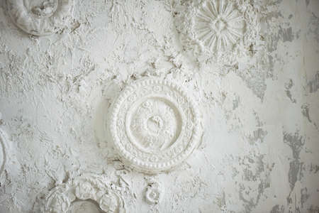 Stucco on a white wall with old plaster. Textureの写真素材