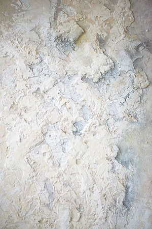 Stucco on a white wall with old plaster. Texture