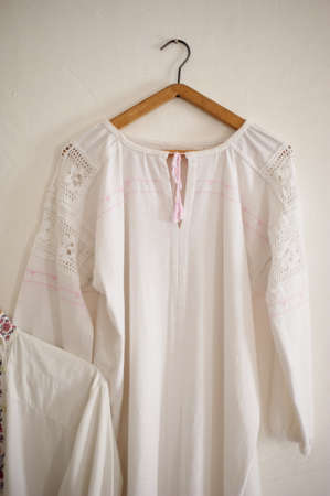 Old white linen shirt. The national dress of the Cossacks. Simple fabrics , ethnics.の写真素材