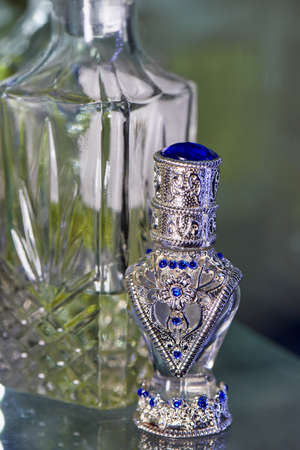 Glass perfume bottles based oils. A Bazaar, market. Aroma oils, oil perfume in faceted glass vessels.の写真素材