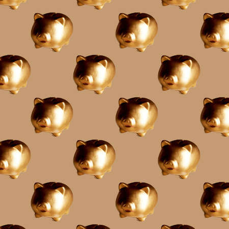 Piggy Bank pattern.Gold on a brown background. Symbol of accumulation, economy and wealth. Investing and saving.の写真素材
