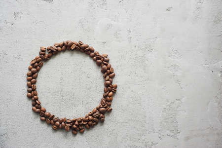 A circle of coffee beans. A place for text. Caffeine addiction.の写真素材