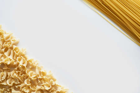 Pasta from hard wheat. Italian pasta. On a white background, on top of the place for text.の写真素材