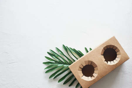 Disposable cardboard coasters. Fastwood, takeaway food. A drink stand.