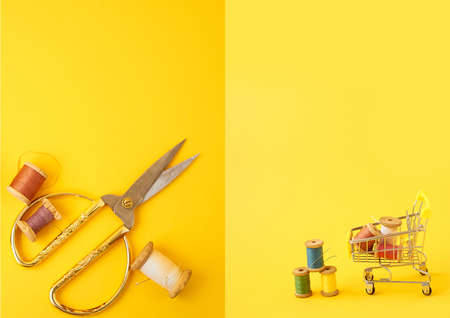 Colored coils with threads on a yellow background.Handicrafts and sewing.